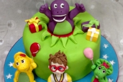 Teddy and his Barney Birthday Cake